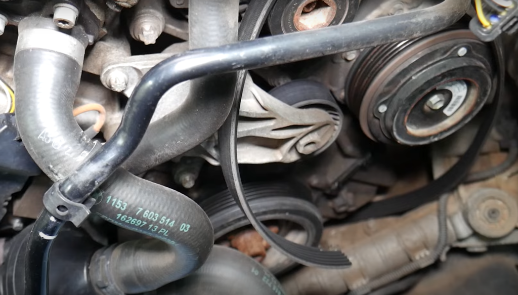 BMW snapped auxiliary belt