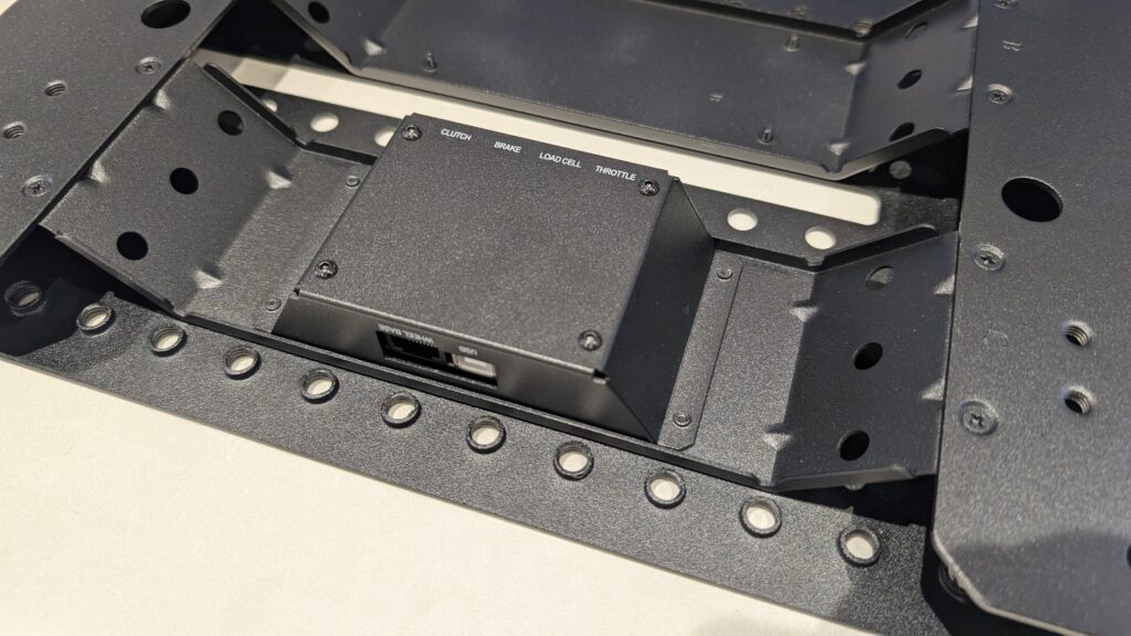 The controller box underneath the pedal plate